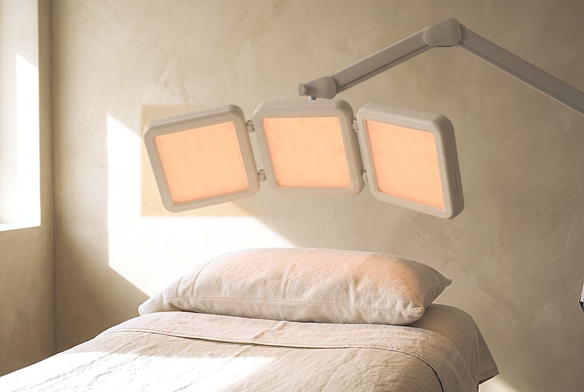 LED light panel over a treatment bed