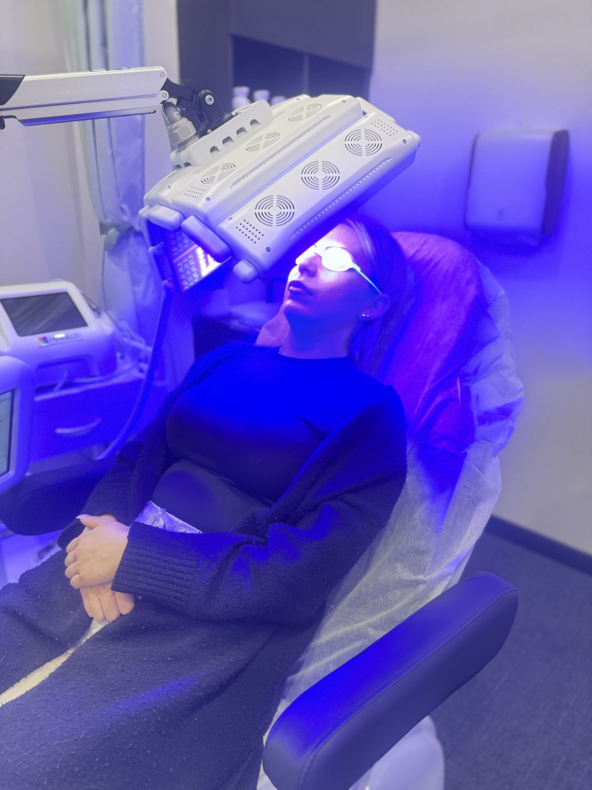 LED light therapy panel in use in a treatment room at The Skin Wellness Hub